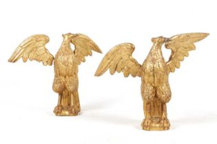 A RARE PAIR OF 18TH CENTURY CARVED GILT WOOD EAGLES