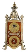 AN UNUSUAL FRENCH ARTS AND CRAFTS MANTEL CLOCK WITH AXE MOON AND CALENDAR DIAL