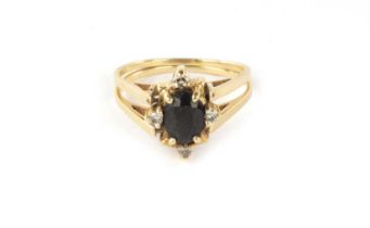 A LADIES 9CT GOLD SAPPHIRE AND DIAMOND REVERSIBLE RING