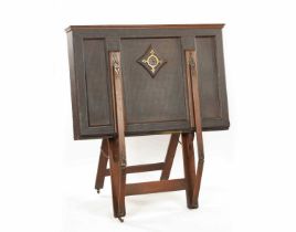 A LATE 19TH-CENTURY PUGINESQUE OAK AND LEATHERWORK FOLIO STAND