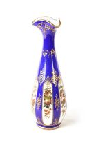A 19TH CENTURY FRENCH BACCARAT STYLE OPALINE AND BLUE GROUND GLASS VASE