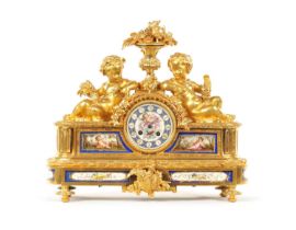 A 19TH CENTURY ORMOLU AND SEVRES STYLE PORCELAIN PANELLED MANTEL CLOCK
