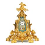 A SMALL LATE 19TH CENTURY FRENCH PORCELAIN PANELLED ORMOLU CARRIAGE STYLE MANTEL CLOCK