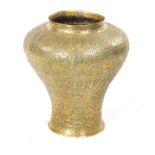 A 19TH CENTURY PERSIAN PIERCED AND ENGRAVED BRASS VASE