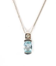 A GOOD .750 HALLMARKED WHITE GOLD PALE BLUE TOPAZ AND DIAMOND PENDANT