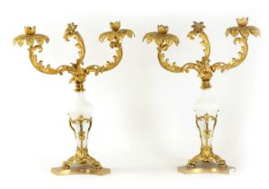 A PAIR OF 19TH CENTURY TWO BRANCH ORMOLU AND OPAQUE GLASS CANDELABRA