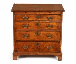 A GEORGE I HERRING-BANDED AND FIGURED WALNUT DRESSING CHEST