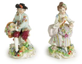 A PAIR OF LATE 19TH CENTURY SITZENDORF FLOWER SELLER FIGURES