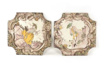 A PAIR OF 18TH CENTURY DELFT POLYCHROME HANGING PLAQUES