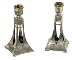 A PAIR OF EARLY 20TH CENTURY WMF SECESSIONIST SILVER PLATED CANDLESTICKS