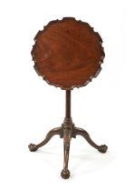 A MID 18TH CENTURY MAHOGANY TILT-TOP TRIPOD TABLE IN THE MANNER OF THOMAS CHIPPENDALE