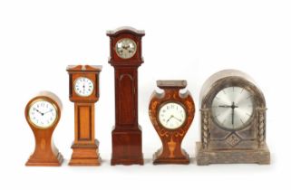 A COLLECTION OF FIVE EDWARDIAN MANTEL CLOCKS
