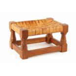 A ROBERT 'MOUSEMAN' THOMPSON HONEY COLOURED JOINED OAK FOOT STOOL