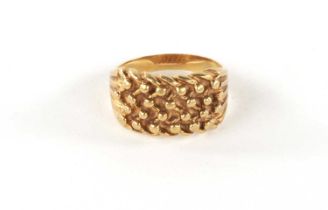 A HALLMARKED YELLOW GOLD DRESS RING