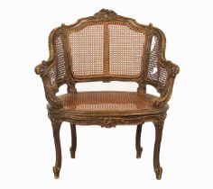 A LATE 19TH CENTURY/EARLY 20TH CENTURY FRENCH OVAL PAINTED BERGERE CHAIR