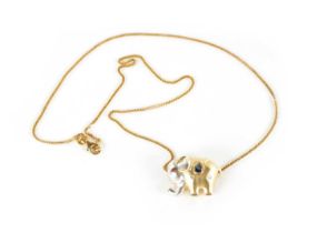 A 14K TWO-COLOUR GOLD ELEPHANT PENDANT