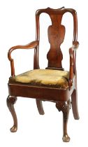 AN EARLY 18TH CENTURY MAHOGANY OPEN ARMCHAIR