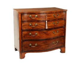 A GOOD GEORGE III SERPENTINE FLAMED MAHOGANY CHEST OF DRAWERS