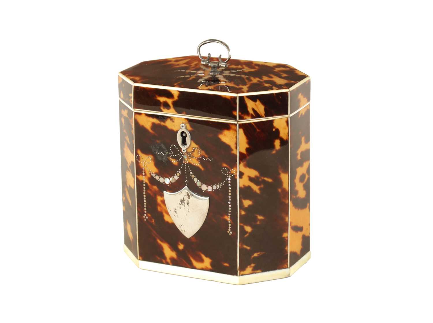 A FINE GEORGE III TORTOISHELL, IVORY AND MOTHER OF PEARL INLAID FACETTED TEA CADDY