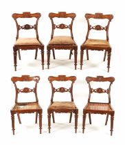 A GOOD SET OF SIX REGENCY ROSEWOOD BERGERE DINING CHAIRS