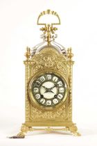 A LATE 19TH CENTURY GILT BRASS AND SILVERED FRENCH INDUSTRIAL STYLE MANTEL CLOCK