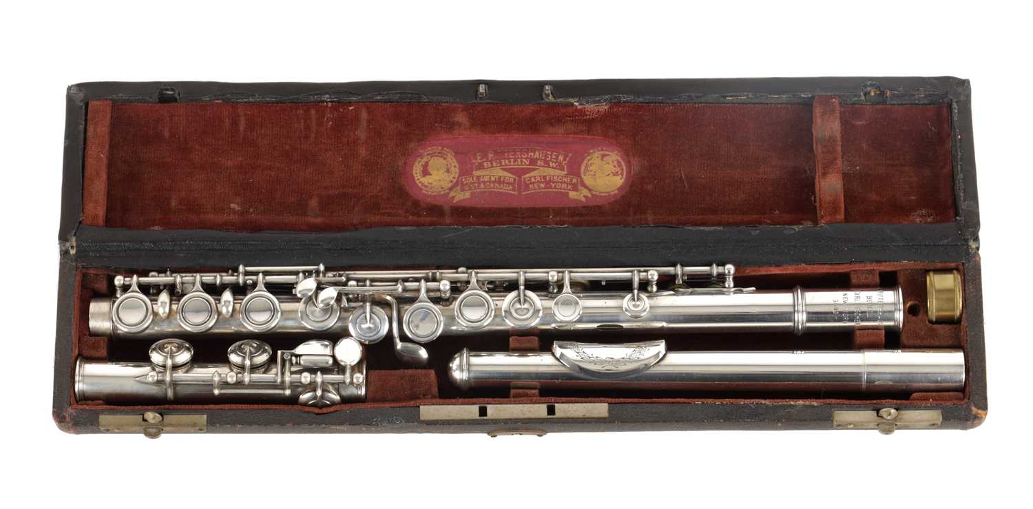 EMIL RITTERSHAUSEN NO 3400. A SILVER FLUTE WITH ENGRAVED LIP PLATE