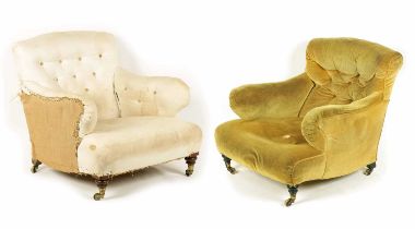 TWO LATE 19TH CENTURY HOWARD STYLE BUTTON UPHOLSTERED LOW SEATED ARMCHAIRS