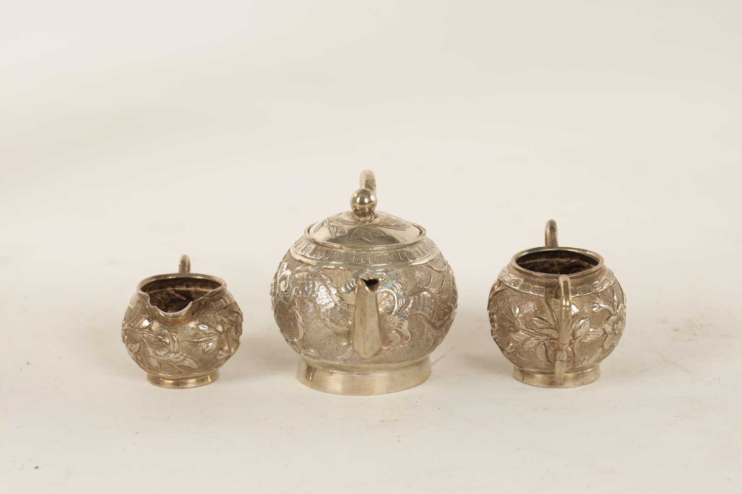 A LATE 19TH CENTURY CHINESE SILVER MINIATURE THREE PIECE TEA SERVICE - Image 4 of 6