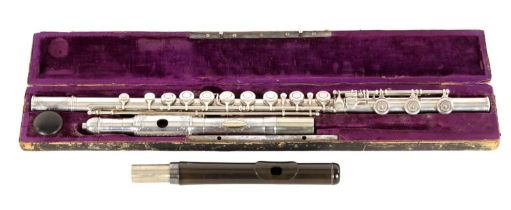 ALFRED G BADGER, NEW YORK. A SOLID SILVER FLUTE WITH GOLD NAME-PLATE