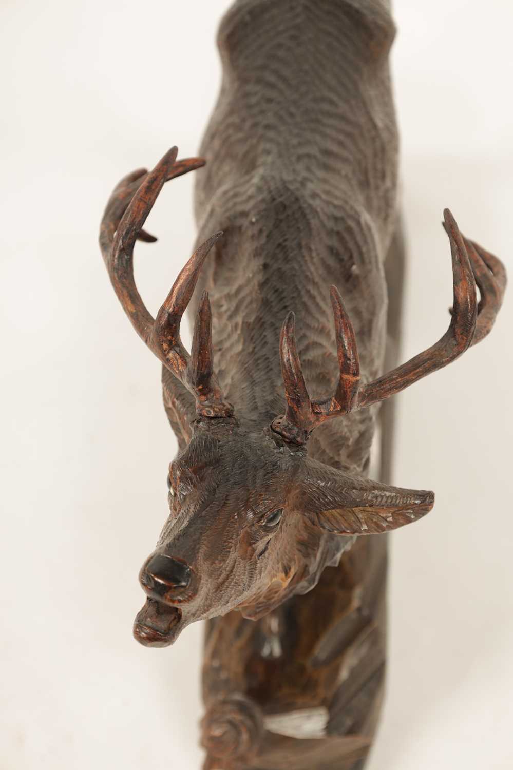 A LARGE EARLY 20TH CENTURY AUSTRIAN CARVED STAG - Image 6 of 7