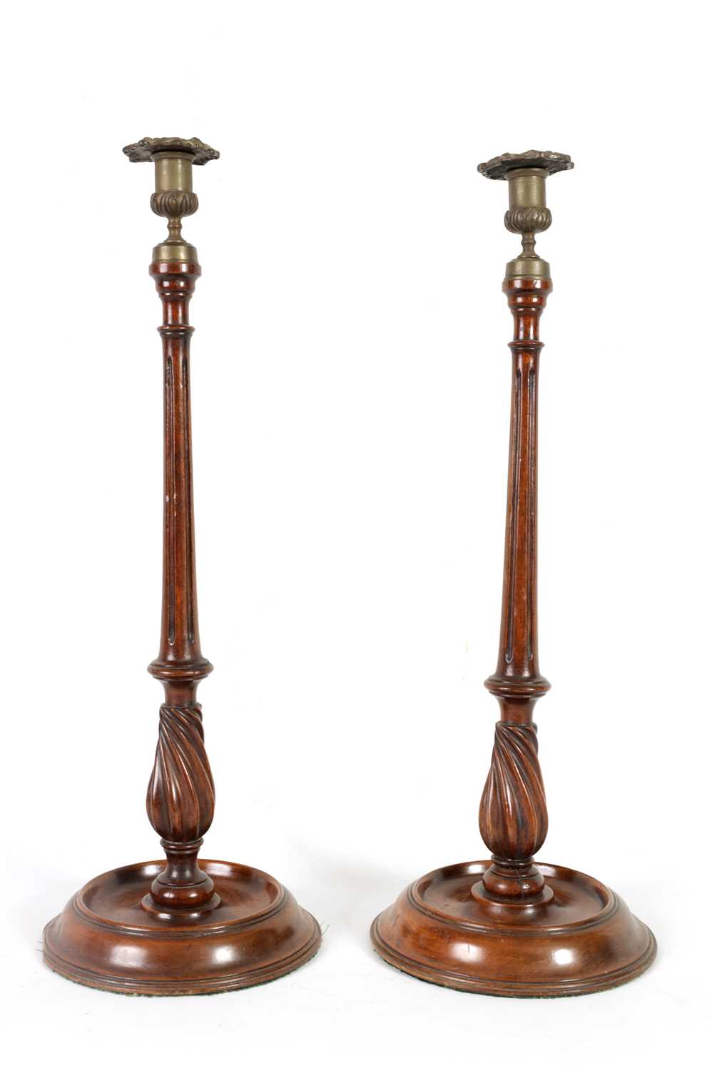 A LARGE PAIR OF LATE 19TH CENTURY TURNED MAHOGANY CANDLESTICKS