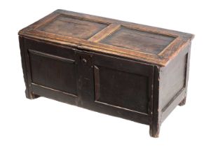 AN EARLY 18TH CENTURY JOINED OAK COFFER OF SMALL SIZE