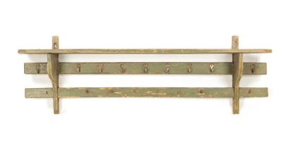 AN 18TH CENTURY PAINTED GREEN HANGING PAN RACK