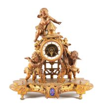 A LATE 19TH CENTURY FRENCH GILT METAL FIGURAL MANTEL CLOCK