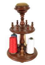 A 19TH CENTURY TURNED MAHOGANY BOBBIN STAND