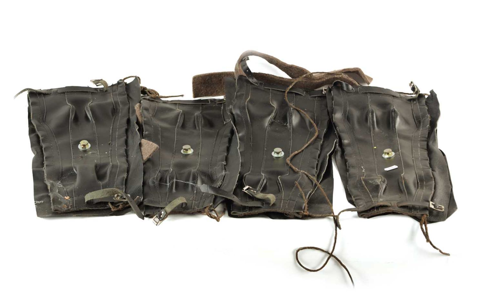 A SET OF FOUR UNUSED LEATHER WEFCO SPRING GAITERS