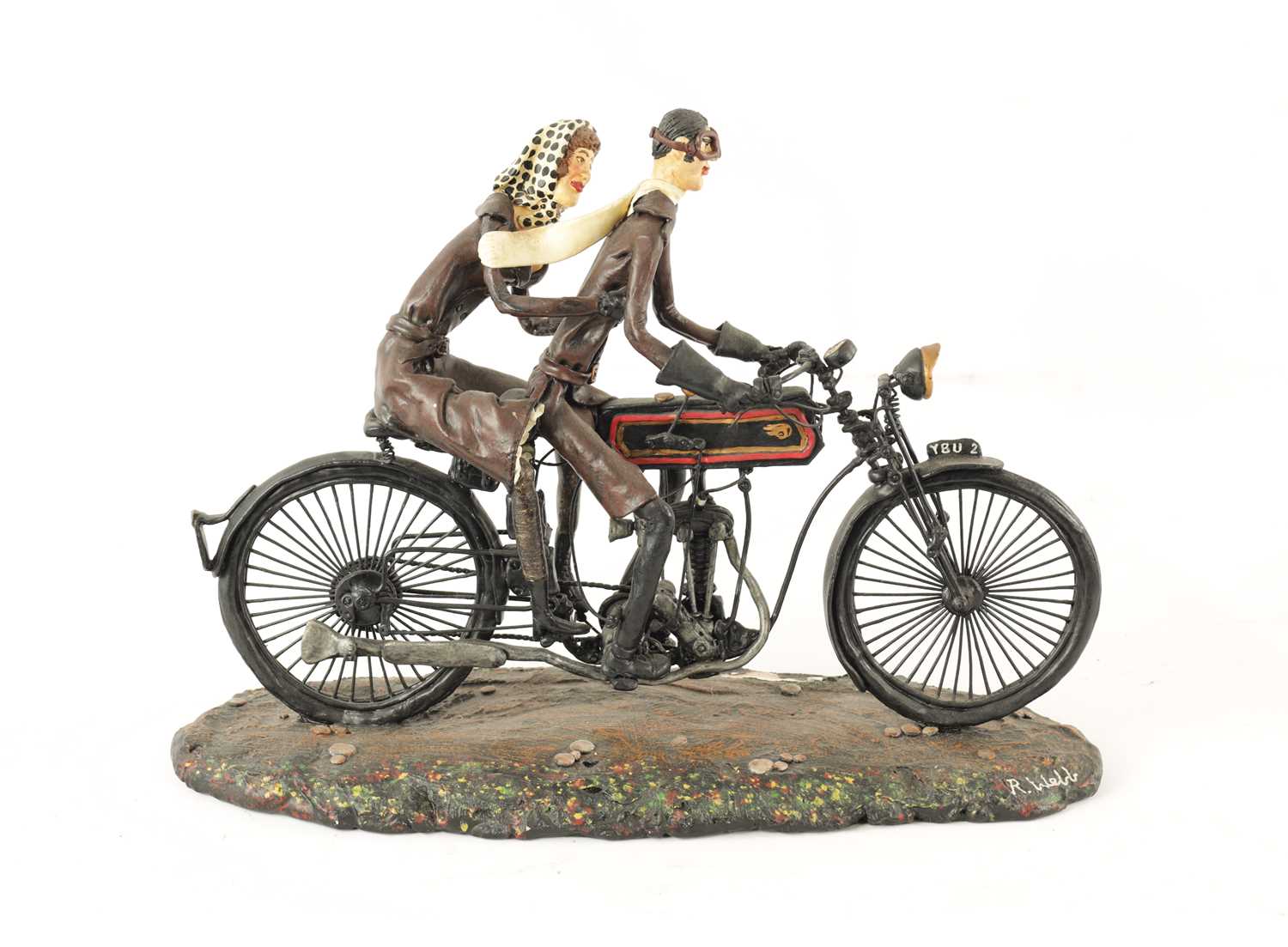 A MODEL SCULPTURE OF A CLASSIC MOTORBIKE