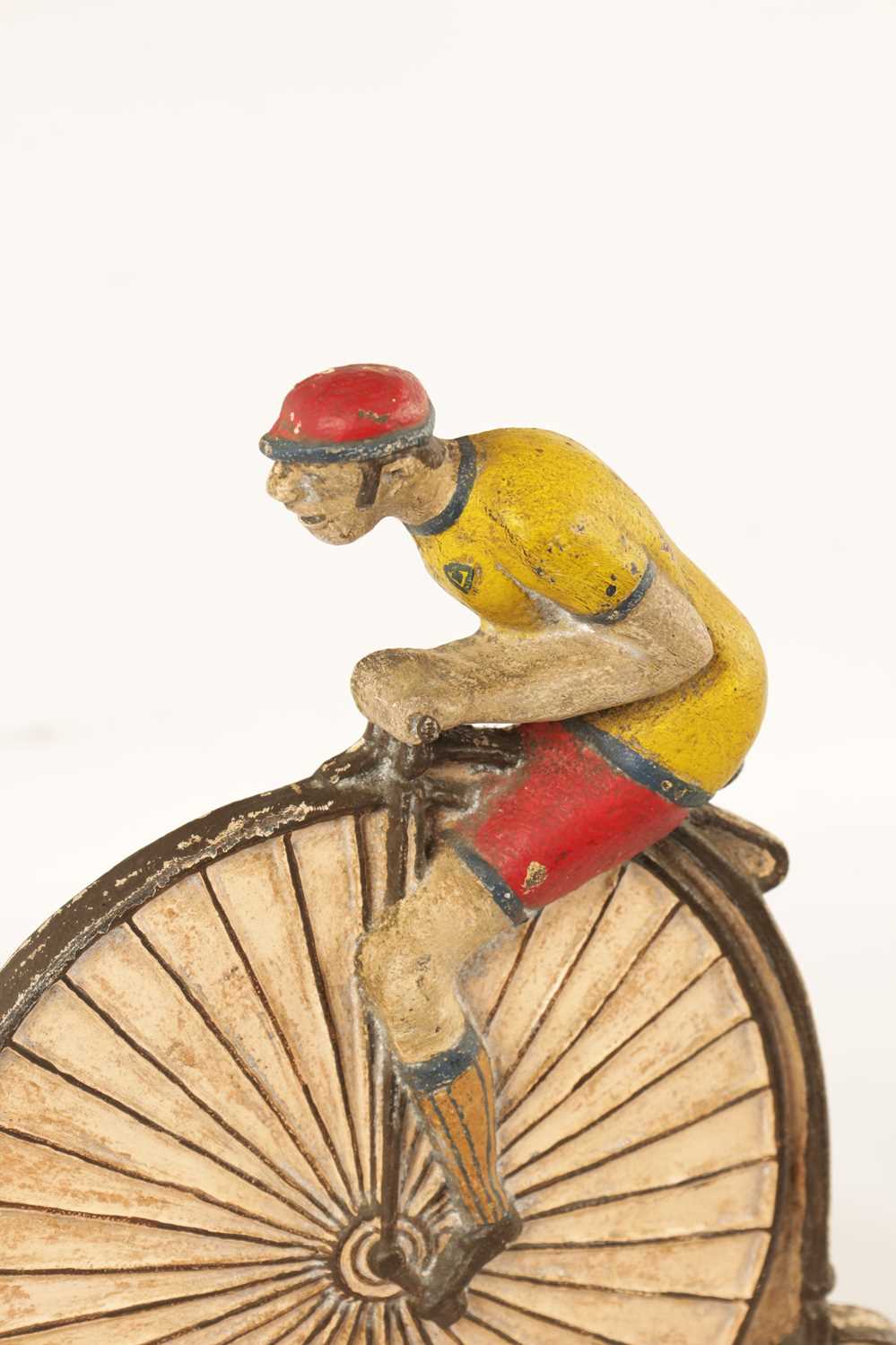 A RARE 19TH CENTURY CAST IRON PAINTED DOORSTOP FORMED AS A CYCLIST MOUNTED ON A PENNY FARTHING - Image 3 of 6
