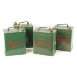 A COLLECTION OF FOUR VINTAGE PETROL CANS