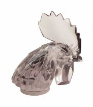 A RENE LALIQUE 'TETE DE COQ' AMETHYST TINTED CLEAR GLASS CAR MASCOT