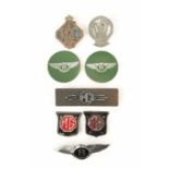 A COLLECTION OF MOTORING BADGES