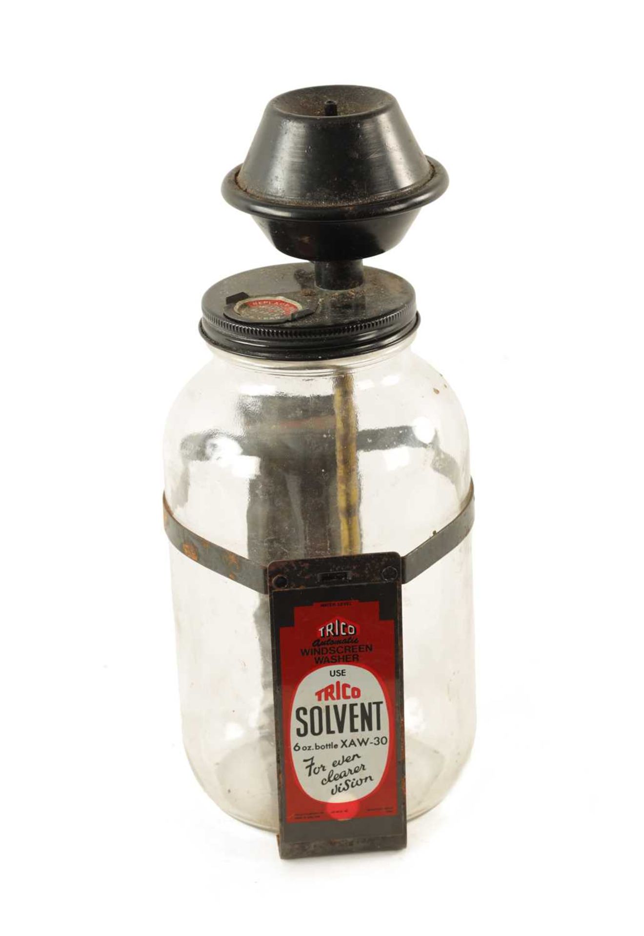 A VINTAGE 'TRICO' AUTOMATIC WINDSCREEN WASHER BOTTLE