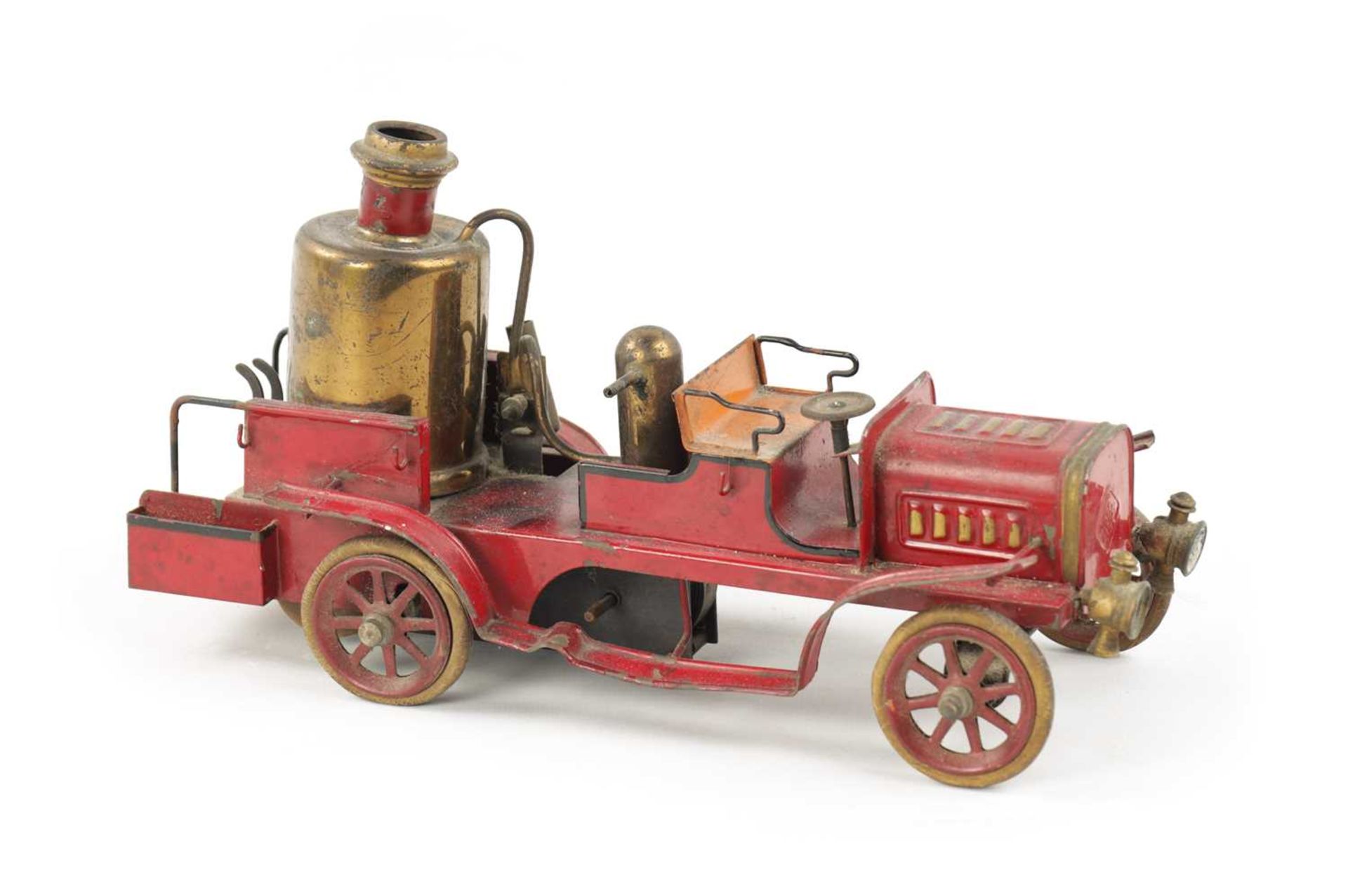 A LATE 20TH CENTURY PRESSED STEEL MUSICAL FIRE 'PUMPER' ENGINE TOY MODEL