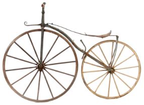 A MID 19TH CENTURY "BONESHAKER" BICYCLE