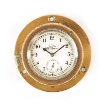 AN EARLY 20TH CENTURY STADIUM 8-DAY BRASS CASED CAR CLOCK