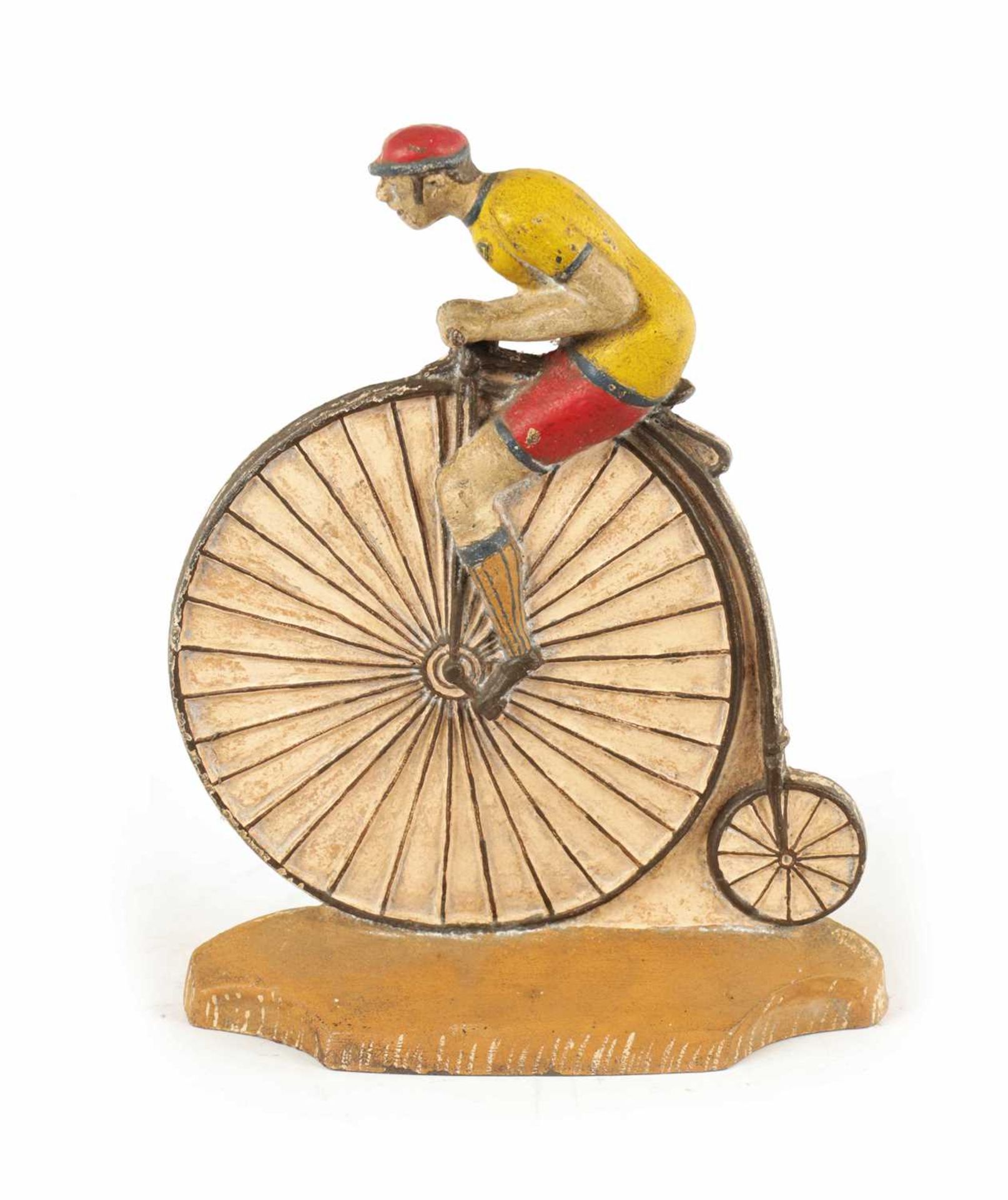A RARE 19TH CENTURY CAST IRON PAINTED DOORSTOP FORMED AS A CYCLIST MOUNTED ON A PENNY FARTHING
