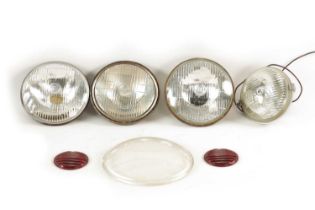 A COLLECTION OF LUCAS LAMPS, GLASSES AND LENSES