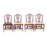 A SET OF FOUR 19TH CENTURY MAHOGANY HEPPLEWHITE STYLE DINING CHAIRS