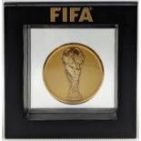 Gold Tone participants medal presented during the 2010 FIFA World Cup in South Africa. The obverse