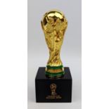 An Official Russia 2018 FIFA World Cup miniature Trophy 14cm in Height